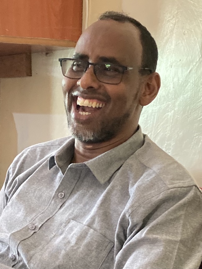 En glad chef på flickhemmet Abdullahi M Abdi